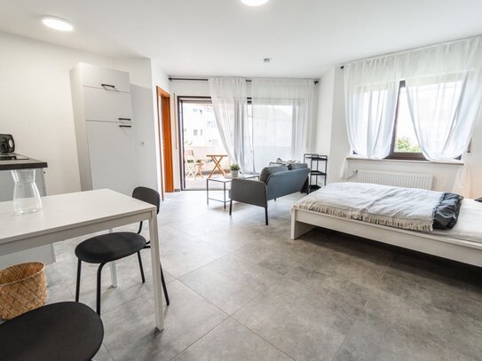 1-Zimmerwohnung mit Wlan, TV, Küche, Dusche/Wc, Waschmaschine, Trockner, Tiefgaragenstellplatz und Balkon