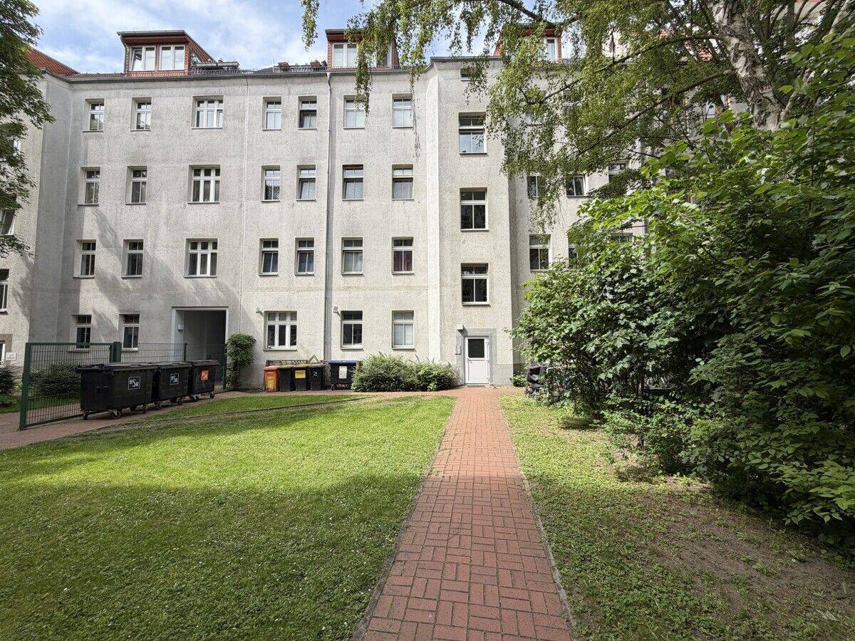 Charmante Maisonettewohnung mit großer Sonnenterrasse und Einbauküche in gepflegtem Altbau - Photo 1