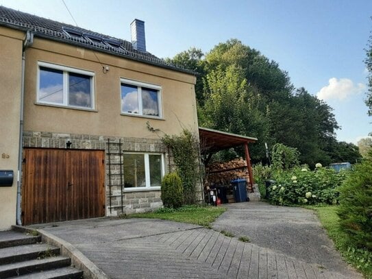 Ausgebaute Doppelhaushälfte mit großem Garten in ruhiger Ortslage zu verkaufen