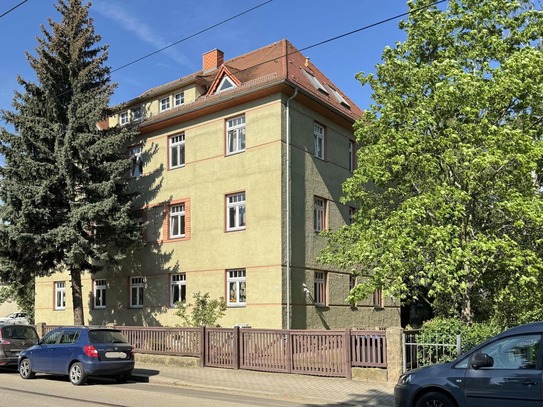 Kleines Raumwunder mit Balkon und großem Garten