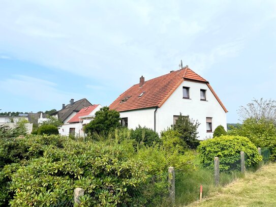 Attraktives Einfamilienhaus mit wunderschönem Weitblick ins Grüne!