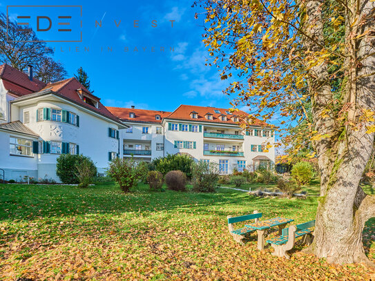 Exklusive Dachgeschosswohnung in historischem Gebäude mit Alpenblick!