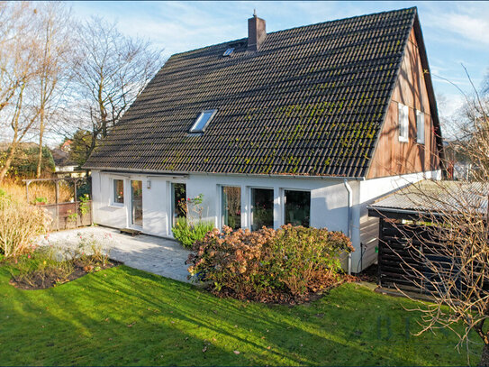 Großzügiges Einfamilienhaus auf Süd-West Grundstück mit Garage und Carport