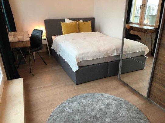 Gemütliches Zimmer in einer Coliving-Wohnung