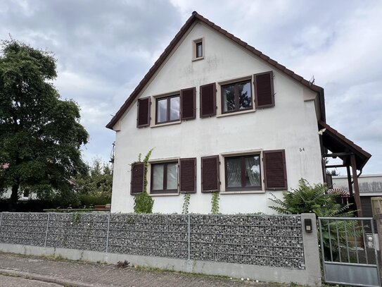 Freistehendes Einfamilienhaus im begehrten Zaygebiet: Stadtnah, ruhig & mit idyllischem Garten