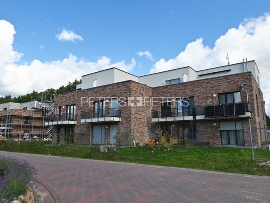 + Moderner Rückzugsort mit Balkon in idyllischer Lage +