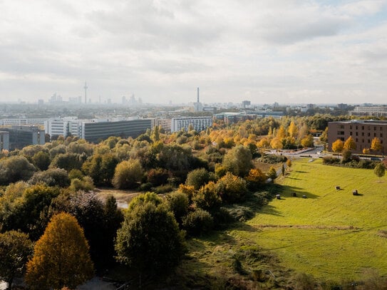 Skyline- und Parkblick: Helle 3-Zimmer-Wohnung mit einzigartiger Eck-Loggia