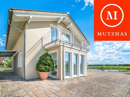 MUTZHAS - Exklusives Einfamilienhaus mit Schwimmteich