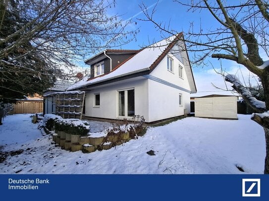 Charmantes Zweifamilienhaus mit Doppelcarport - ideal zur Eigennutzung oder Vermietung!