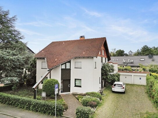 Zweifamilienhaus mit stillem Gewerbe, großer Wohnung und schönem Garten