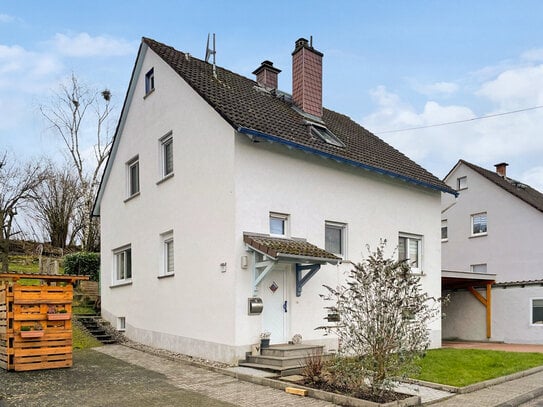 Charmantes Einfamilienhaus mit Garten und Kamin - Ihr neues Zuhause in idyllischer Lage in Brachttal