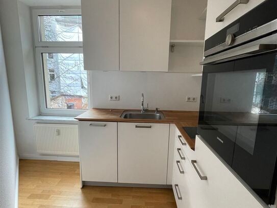 2 Zimmer Singlewohnung mit Balkon und Einbauküche im ruhigen Hinterhaus