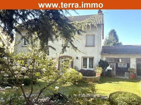 Mehrfamilienhaus mit Werkstatt und einem wunderschönen Garten!