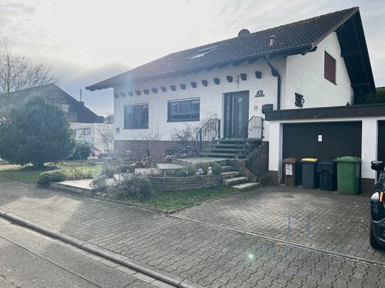 **schönes Einfamilienhaus mit Einliegerwohnung und Garten**