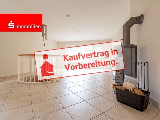 Erdgeschosswohnung nebst Souterrainbereich, eigener Terrasse, Garage und Ofen im offenen Wohnbereich!