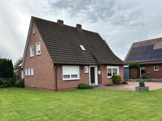 Einfamilienhaus mit Garage und großem Garten in zentraler Lage von Papenburg-Obenende