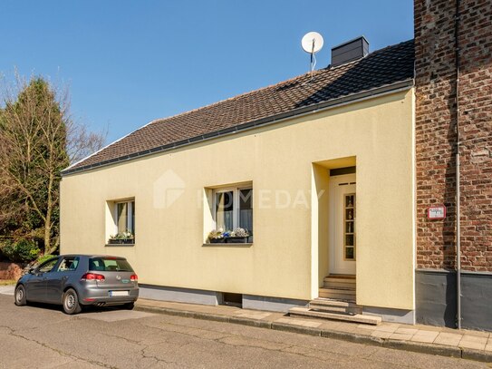 Charmantes Einfamilienhaus mit einladender Terrasse und malerischem Hof