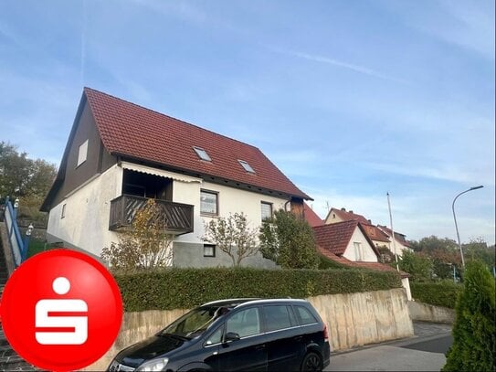 Einfamilienhaus mit Garage und Nebengebäude in 97618 Hollstadt