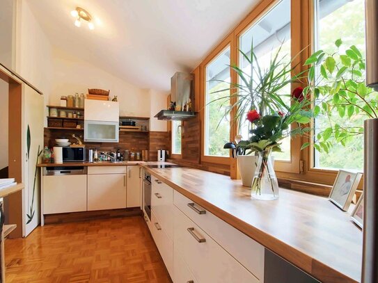 Schöne Maisonette-Wohnung mit Dachterrasse, Garten zur Alleinnutzung und Fernwärme