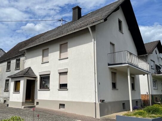 Gepflegtes Einfamilienhaus mit Balkon - Ideal für Familien