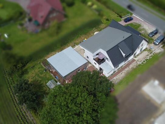 Renditeobjekt! Mehrfamilienhaus in zentraler Lage von Südbrookmerland (OT Moordorf)