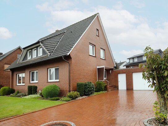 Modernisiertes Ein-/ Zweifamilienhaus auf sonnigem Grundstück in familienfreundlicher Siedlung