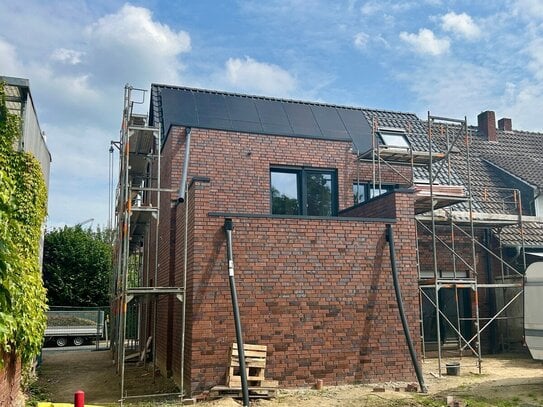 Neubau-Highlight in bester Lage: Moderne Obergeschosswohnung mit großzügiger Dachterrasse