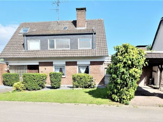 Freistehendes Haus auf großem Grundstück mit Garage u Carport genutzt als Zweifamilienhaus