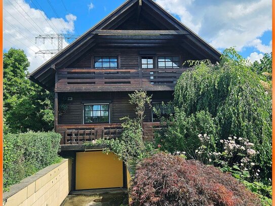 Holzblockhaus im Grünen mit Schwimmbad und großer Terrasse - Tiefgarage - Photovoltaik - E-Ladestati