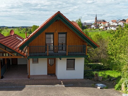 Einfamilienhaus mit Einliegerwohnung, Garten, Carport und wunderschöner Aussicht in Rothenberg zu verkaufen!