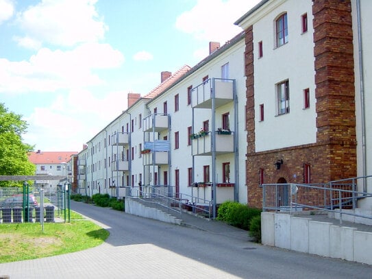 Eine schöne Erdgeschosswohnung mit Balkon