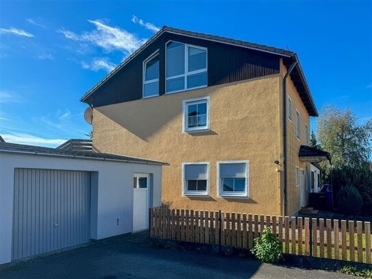 Maisonette-Eigentumswohnung mit Garten und Garage