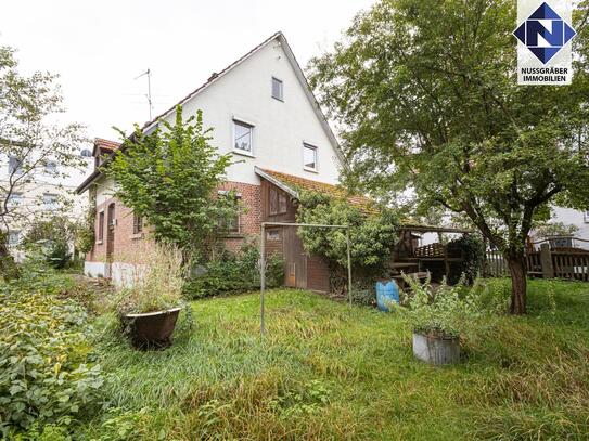 Grüne Idylle mitten im Zentrum - Einfamilienhaus mit Charme und großem Garten