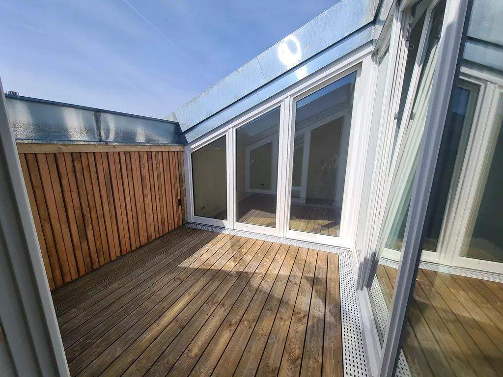 Sanierte Wohnung mit traumhaftem Blick von der Dachterrasse! - Foto 1