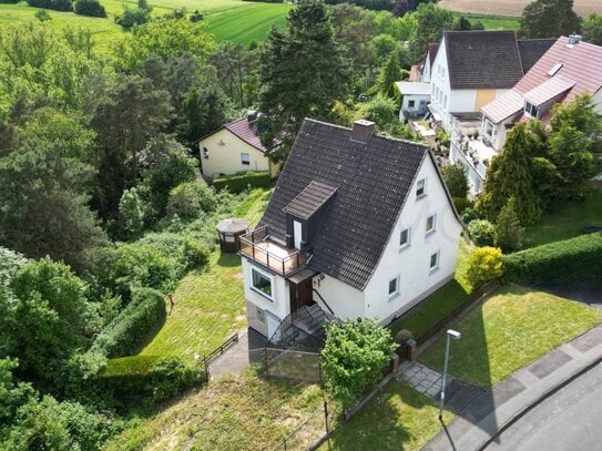 Charmantes Einfamilienhaus in Alleinlage mit traumhaftem Ausblick und vielseitigem Potenzial!