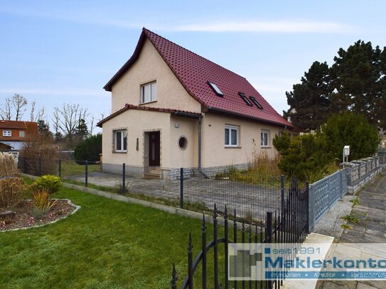 Einfamilienhaus in ruhiger Lage mit Dachterrasse und Werkstatt