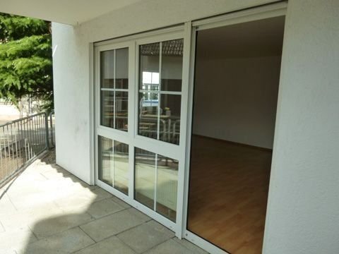 Gemütliche 3 ½ - Zimmer-EG-Wohnung mit Balkon und 2 Tiefgaragenstellplätzen