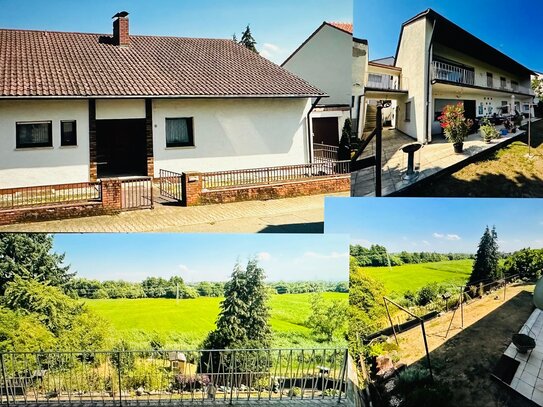 Einfamilienhaus mit toller Aussicht in die unverbaute Natur inkl. vermietete Einliegerwohnung