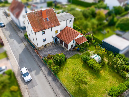 Charmantes Einfamilienhaus mit Garten und Doppelgarage in Solms-Albshausen!