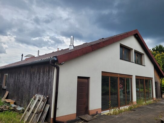 Ein-/Zwei Familienhaus mit Gewerbefläche und erneuerbaren Energieträgern in Menden!