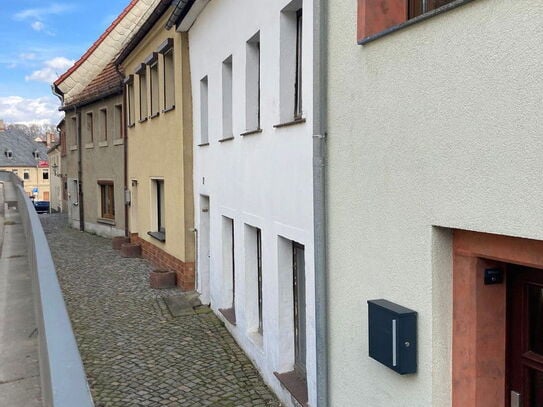 Sanierungsbedürftige Reihenmittelhaus mit einem Garten für Handwerker