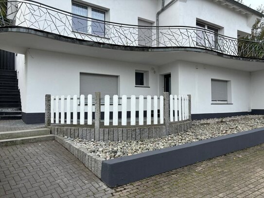 Souterrainwohnung mit Terrasse