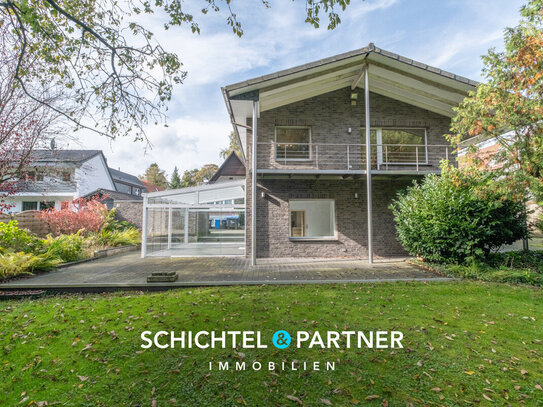 Ritterhude | Modernisiertes Einfamilienhaus mit Balkon, Terrasse und zwei Garagen in begehrter Lage