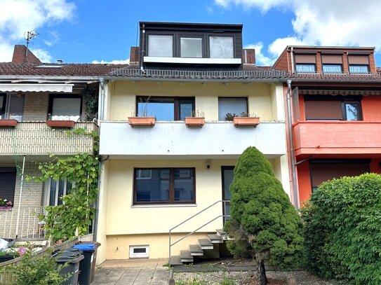 ANLAGEOBJEKT in UTBREMEN! 2-Familien-RH mit Vollkeller, Terrasse und Balkon in gesuchter Wohnstraße