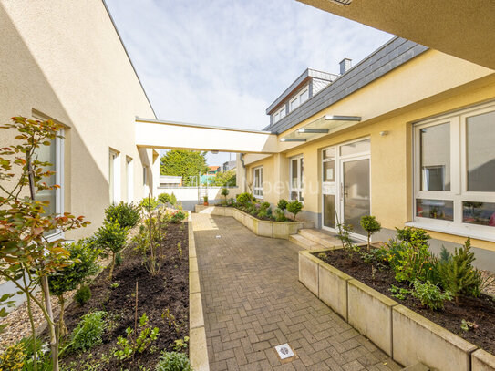 Attraktive 4-Zimmer-Maisonettewohnung, 2 TG-Stellplätze, Dachterrasse in Südwestlage