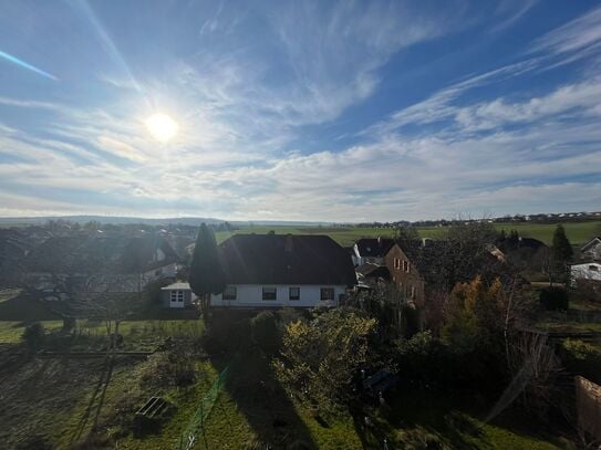 Idyllische Wohnung mit riesiger Terrasse und Gartenanteil in toller Lage in Marburg-Schröck!