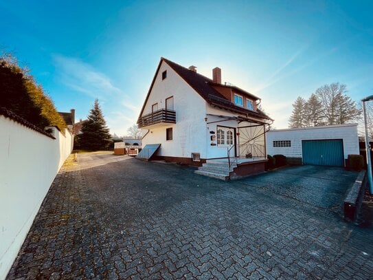 Freistehendes 1-Familienhaus mit Garage, vielen Stellplätzen und wunderschönem Garten in ruhiger Wohnlage von 66981 Mün…