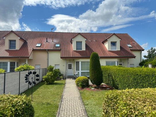 Exklusive Anlagechance: Vermietetes Reihenmittelhaus mit idyllischem Ausblick in bester Lage!