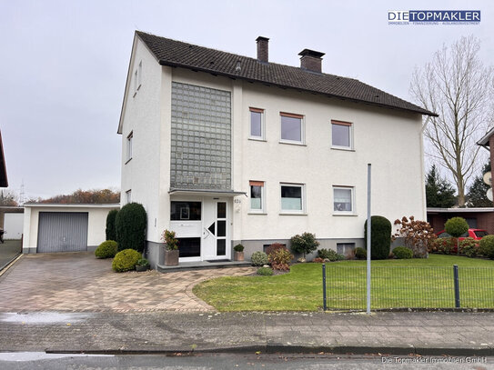 Charmantes Zweifamilienhaus mit traumhaftem Gartenblick