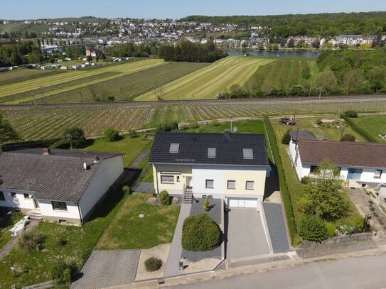 Perl-Nennig: Luxuriöses Anwesen (1-2 FH + ELW) mit unverbaubarem Blick auf die Mosel und auf Remich!